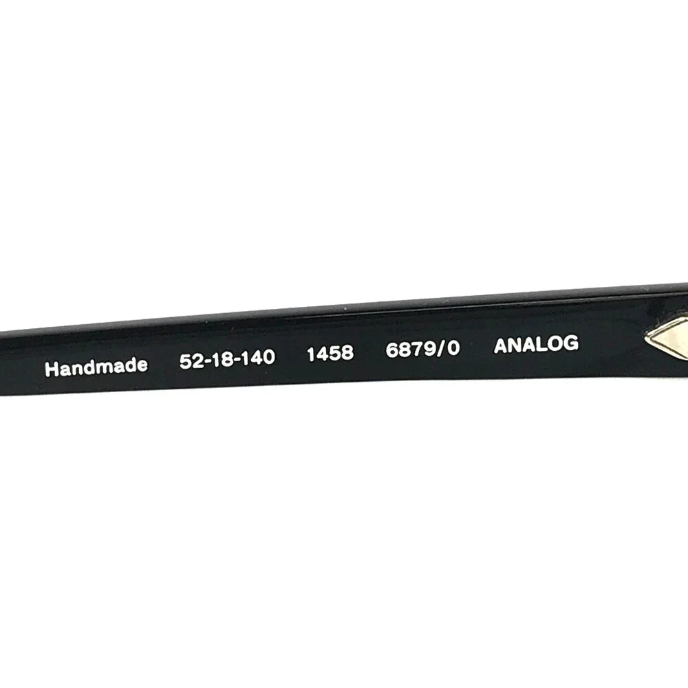 Gigi Studios Eyeglasses Frames ANALOG 6879/0 Black White Striped Round 52-18-140